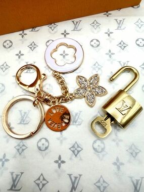 Louis Vuitton Gold-Tone Floral Crystal and White Enamel Key Charm